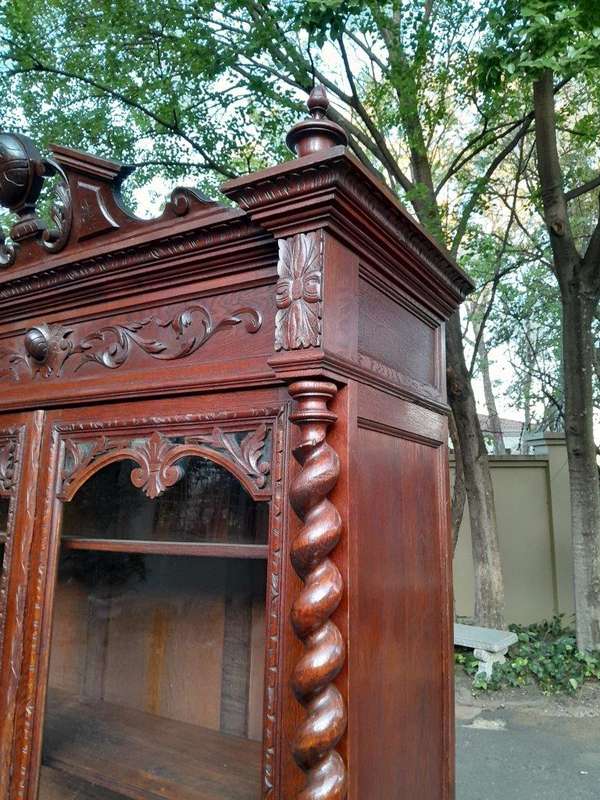 A 19th Century French Louis XVI- Style  Carved Oak Bookcase Cabinet with Glazed Doors