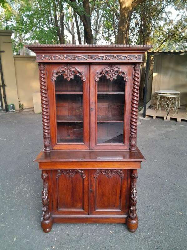 A 19th Century Victorian Carved Mahogany Bookcase Cabinet display / bookcase cabinet with Glazed ...
