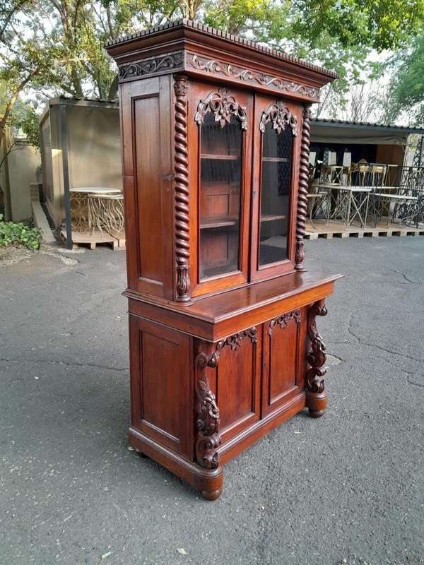 A 19th Century Victorian Carved Mahogany Bookcase Cabinet display / bookcase cabinet with Glazed ...