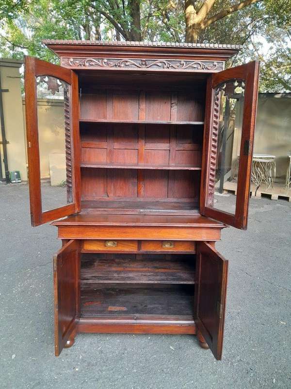 A 19th Century Victorian Carved Mahogany Bookcase Cabinet display / bookcase cabinet with Glazed ...