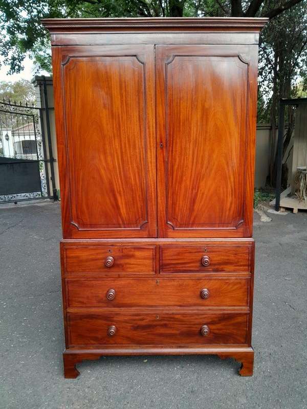 An Early 800s George III Linen Press Cupboard with Patina