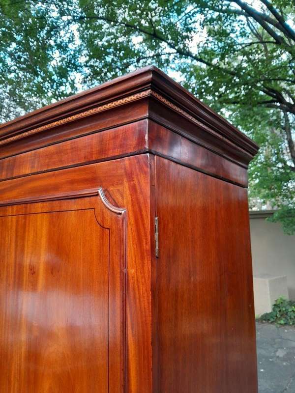 An Early 800s George III Linen Press Cupboard with Patina