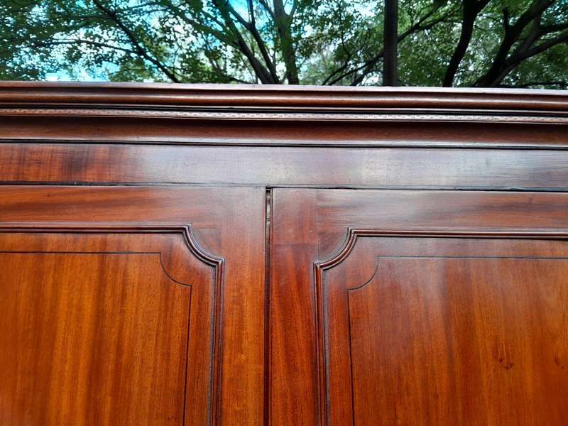 An Early 800s George III Linen Press Cupboard with Patina