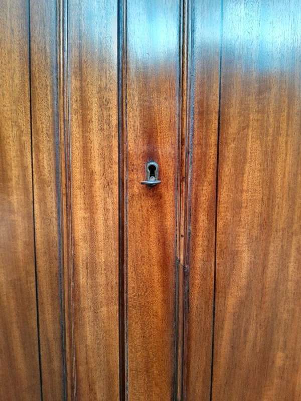 An Early 800s George III Linen Press Cupboard with Patina