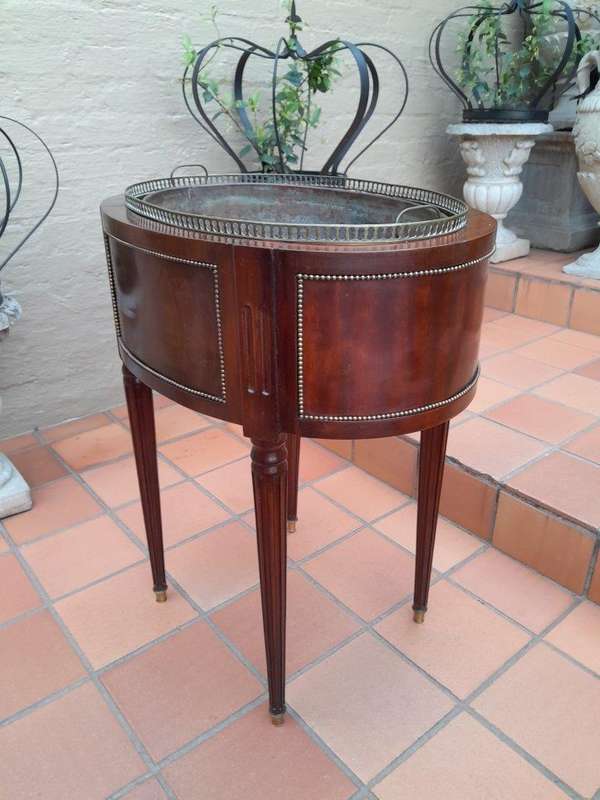 A 20th Century French Mahogany and Gilt Cellarette / wine cooler with Metal Waterproof Inner