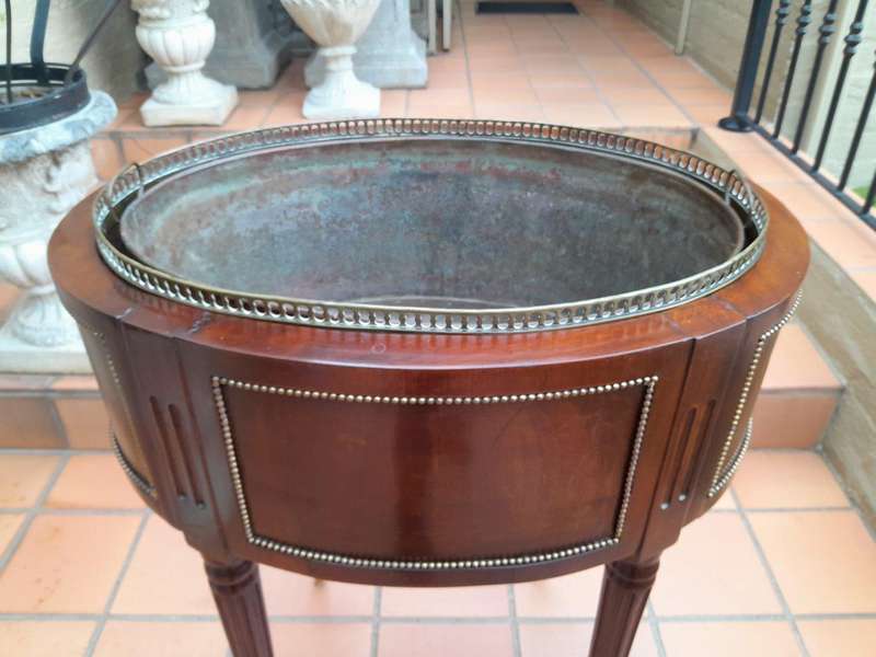 A 20th Century French Mahogany and Gilt Cellarette / wine cooler with Metal Waterproof Inner