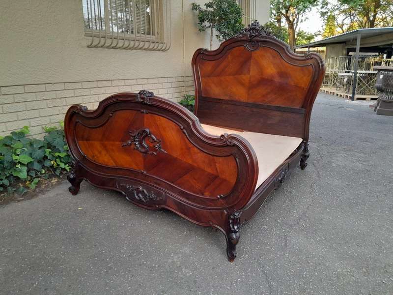 A 20th Century French Ornately Carved Rosewood Double Bed with Headboard, Footboard and Side Rails