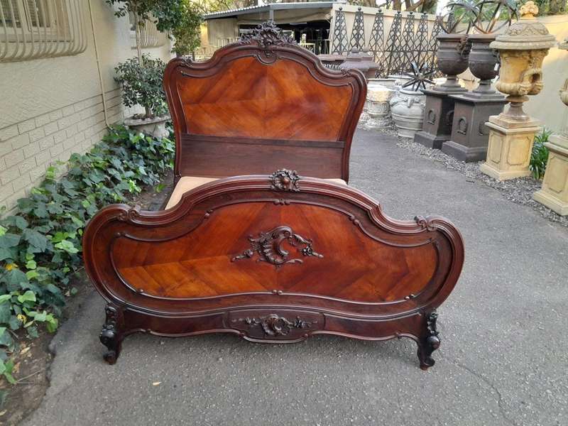 A 20th Century French Ornately Carved Rosewood Double Bed with Headboard, Footboard and Side Rails