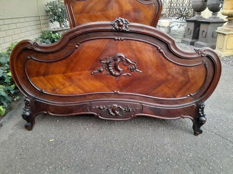 A 20th Century French Ornately Carved Rosewood Double Bed with Headboard, Footboard and Side Rails