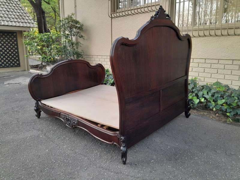 A 20th Century French Ornately Carved Rosewood Double Bed with Headboard, Footboard and Side Rails