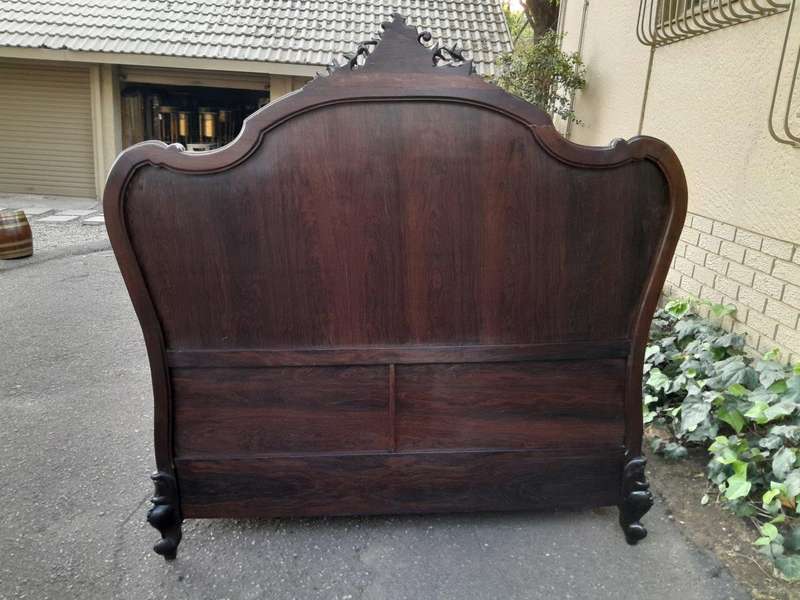 A 20th Century French Ornately Carved Rosewood Double Bed with Headboard, Footboard and Side Rails