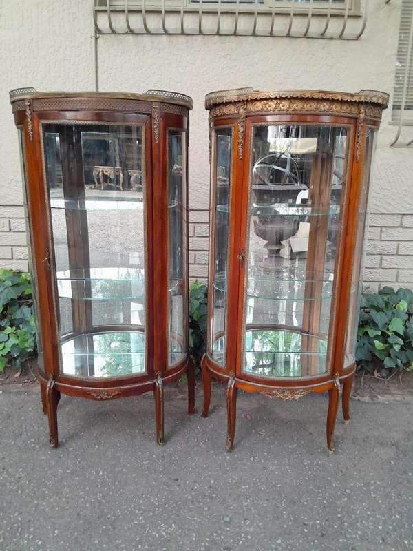 A Rare Near Pair of 20th Century French Style Vitrine / Display Demi Lune Cabinets With Brass Gal...