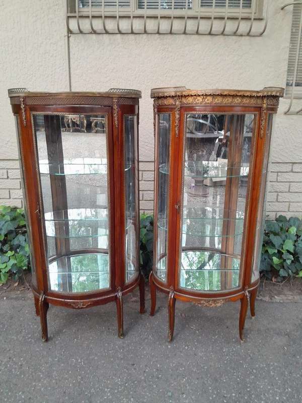 A Rare Near Pair of 20th Century French Style Vitrine / Display Demi Lune Cabinets With Brass Gal...