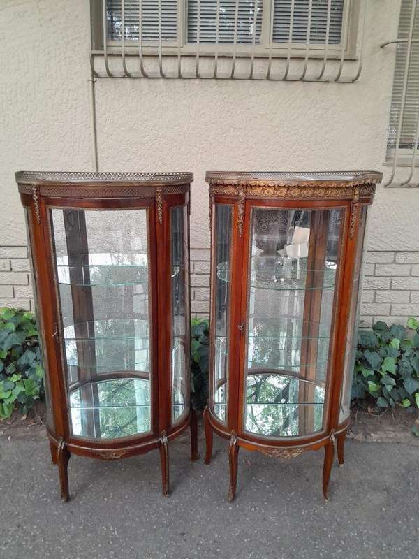 A Rare Near Pair of 20th Century French Style Vitrine / Display Demi Lune Cabinets With Brass Gal...