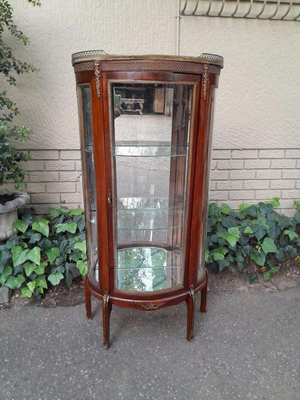 A Rare Near Pair of 20th Century French Style Vitrine / Display Demi Lune Cabinets With Brass Gal...