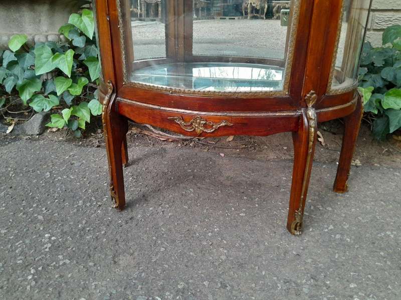 A Rare Near Pair of 20th Century French Style Vitrine / Display Demi Lune Cabinets With Brass Gal...