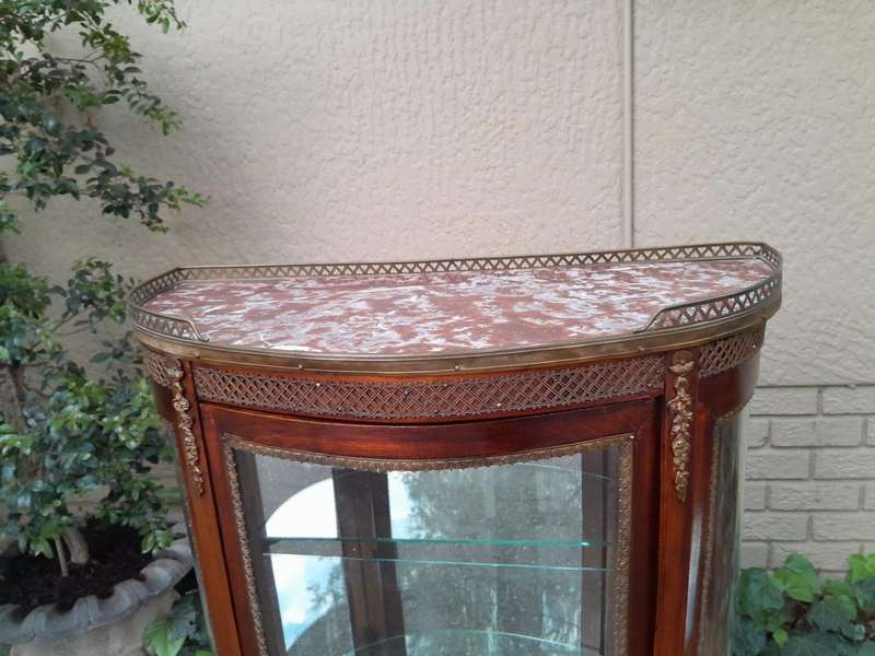 A Rare Near Pair of 20th Century French Style Vitrine / Display Demi Lune Cabinets With Brass Gal...