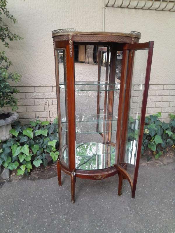 A Rare Near Pair of 20th Century French Style Vitrine / Display Demi Lune Cabinets With Brass Gal...