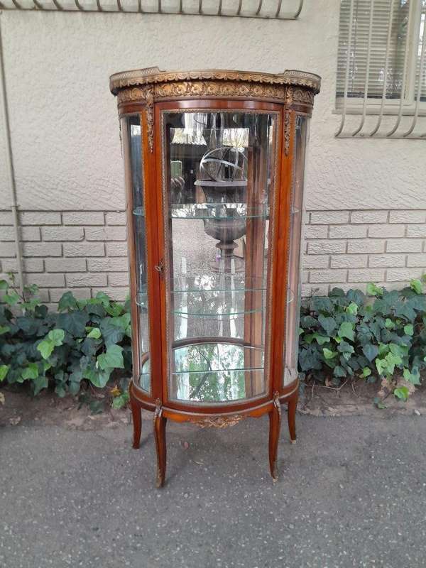 A Rare Near Pair of 20th Century French Style Vitrine / Display Demi Lune Cabinets With Brass Gal...