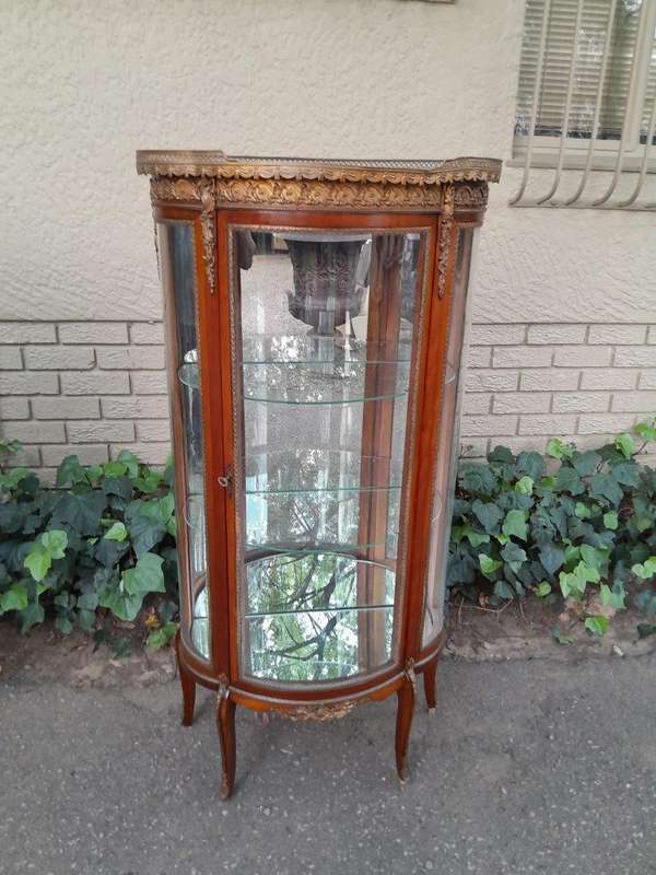 A Rare Near Pair of 20th Century French Style Vitrine / Display Demi Lune Cabinets With Brass Gal...