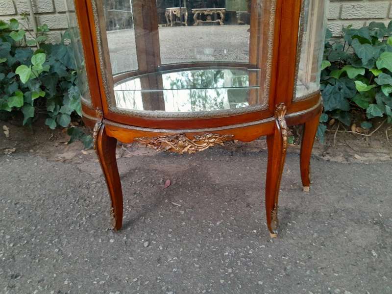 A Rare Near Pair of 20th Century French Style Vitrine / Display Demi Lune Cabinets With Brass Gal...