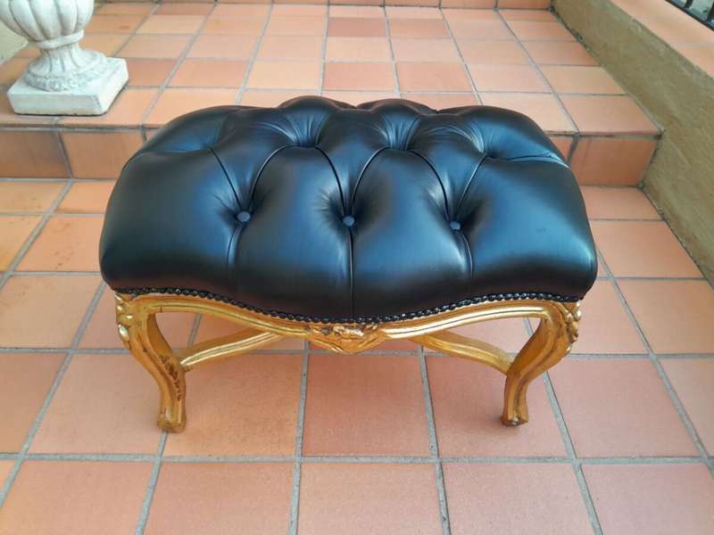 A French Style Giltwood Ottoman / Tuffet / Stool Upholstered in Deep Buttoned Leather