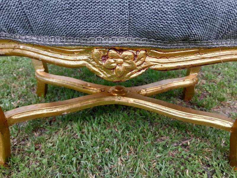 A French Style Giltwood Ottoman / Tuffet / Stool Upholstered in Deep Buttoned Leather