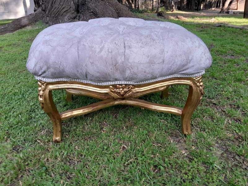 A French Style Giltwood Ottoman / Tuffet / Stool Upholstered in Deep Buttoned Leather