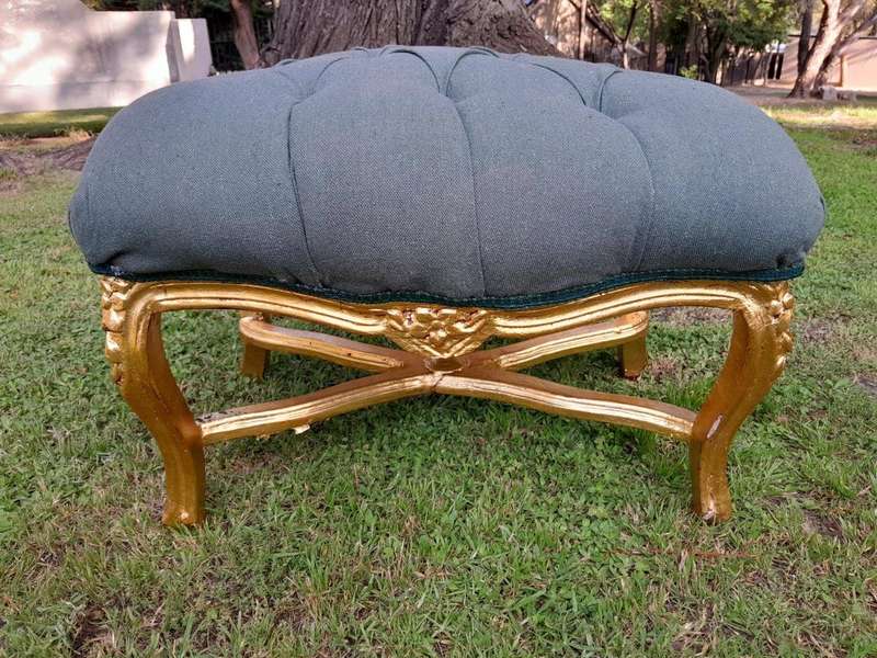 A French Style Giltwood Ottoman / Tuffet / Stool Upholstered in Deep Buttoned Leather
