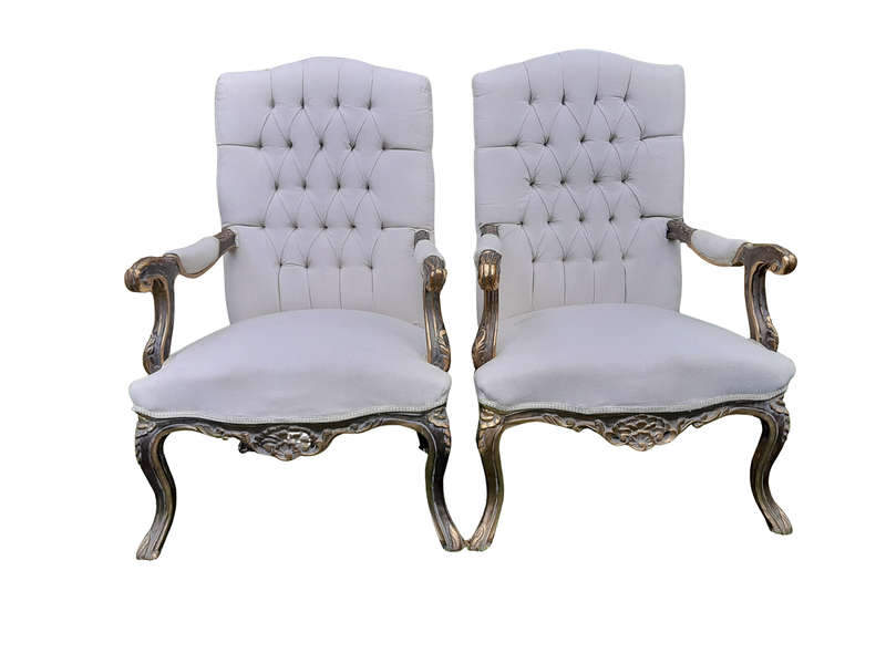 A 20th Century Pair Of French Style Carved And Giltwood High-Back Chairs In Leather