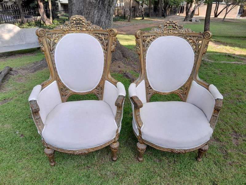 A Pair Of French Style Giltwood Ornate Arm Chairs