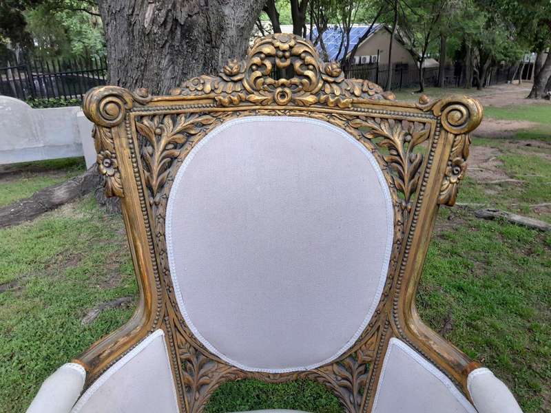 A French Style Giltwood Ornately Carved Settee With A Pair Of Matching Armchairs