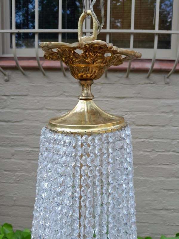 A 20th Century Empire French Style Brass And Crystal Chandelier