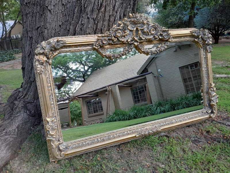A French Rococo Style Ornately Carved And Gilded Bevelled Mirror 6