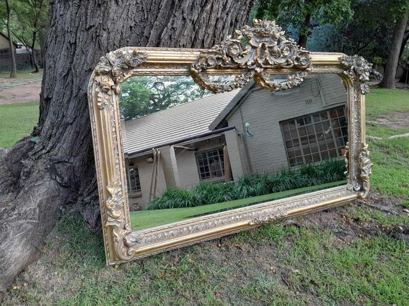 A French Rococo Style Ornately Carved And Gilded Bevelled Mirror 6