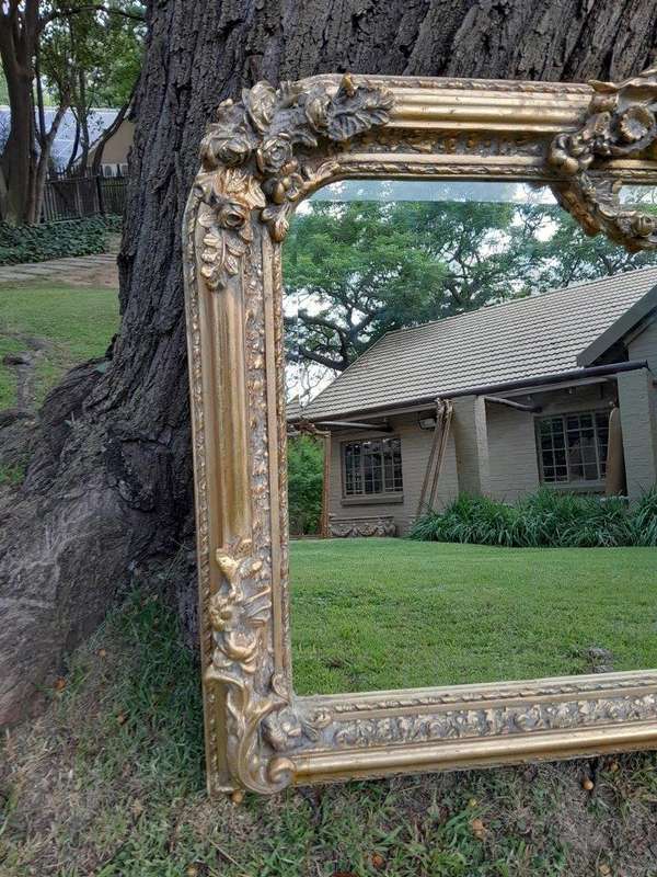 A French Rococo Style Ornately Carved And Gilded Bevelled Mirror 6