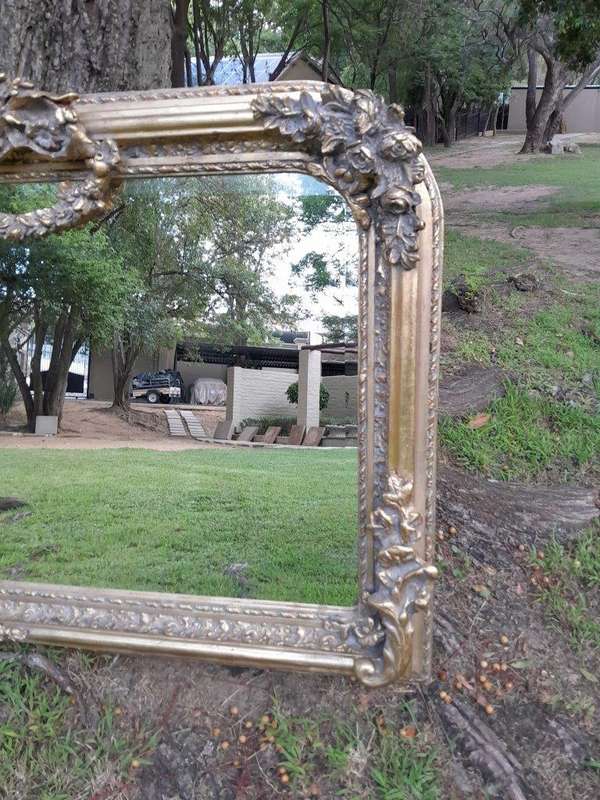 A French Rococo Style Ornately Carved And Gilded Bevelled Mirror 6