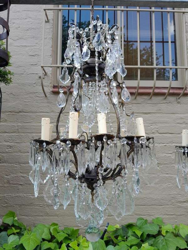 A 20th Century Pair Of French Style Brass & Crystal Chandeliers