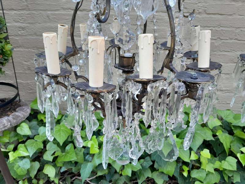 A 20th Century Pair Of French Style Brass & Crystal Chandeliers