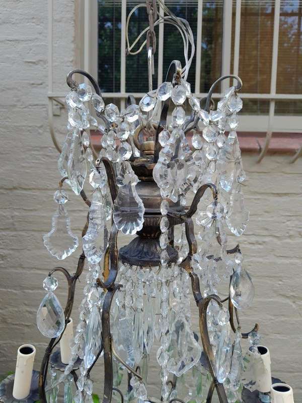 A 20th Century Pair Of French Style Brass & Crystal Chandeliers