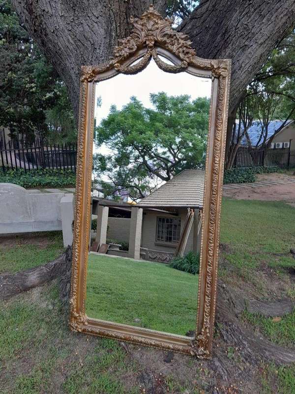 A French Rococo Style Ornately Carved And Gilded Bevelled Mirror 4