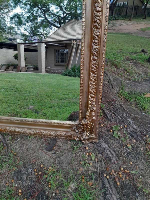A French Rococo Style Ornately Carved And Gilded Bevelled Mirror 4