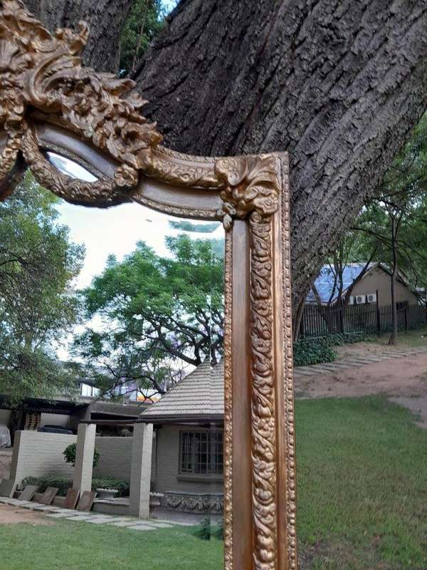 A French Rococo Style Ornately Carved And Gilded Bevelled Mirror 4