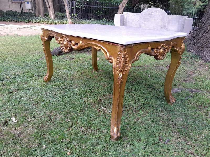 A French Style Ornately Carved Coffee Table with Marble Top