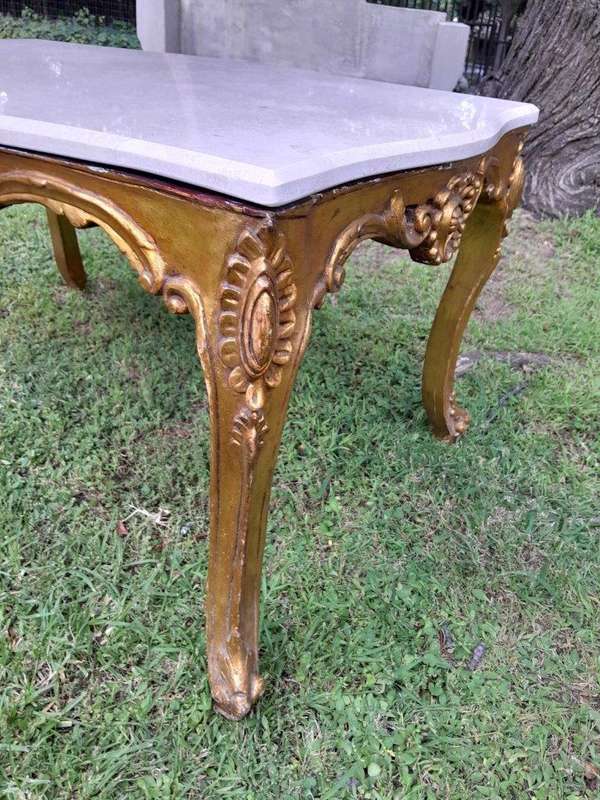 A French Style Ornately Carved Coffee Table with Marble Top