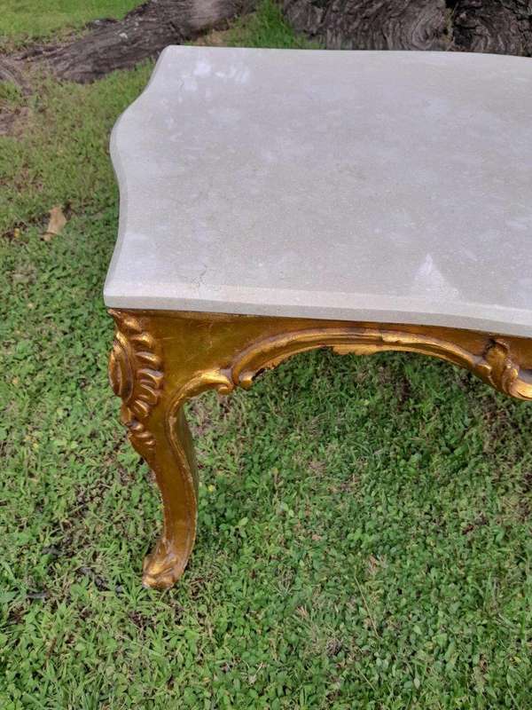 A French Style Ornately Carved Coffee Table with Marble Top