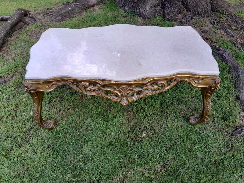A French Style Ornately Carved Coffee Table with Marble Top