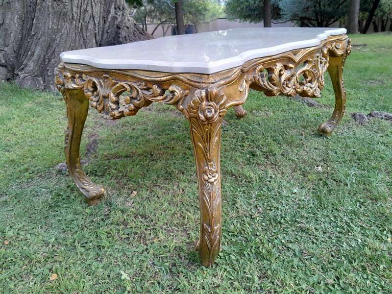 A French Style Ornately Carved Coffee Table with Marble Top