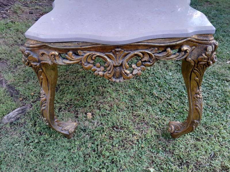 A French Style Ornately Carved Coffee Table with Marble Top