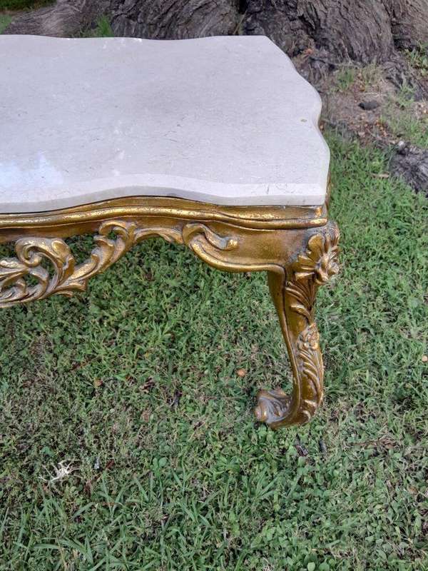 A French Style Ornately Carved Coffee Table with Marble Top